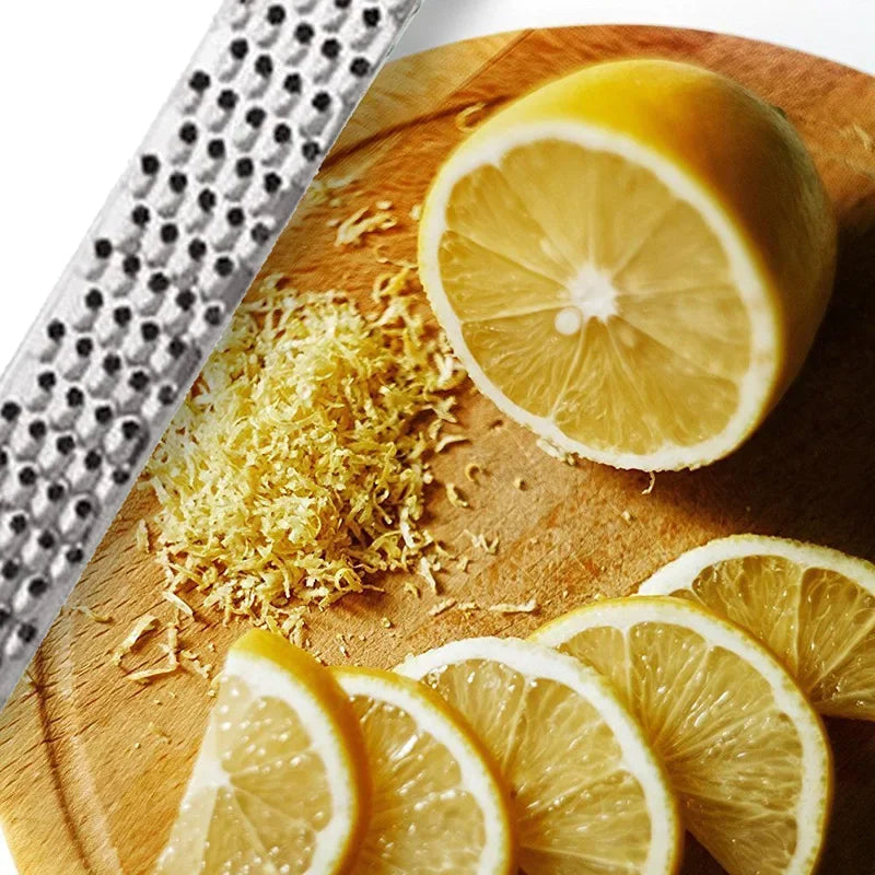 Stainless Steel Handheld Cheese Grater – Multi-Purpose Garlic, Vegetable, Lemon Zester & Grinder