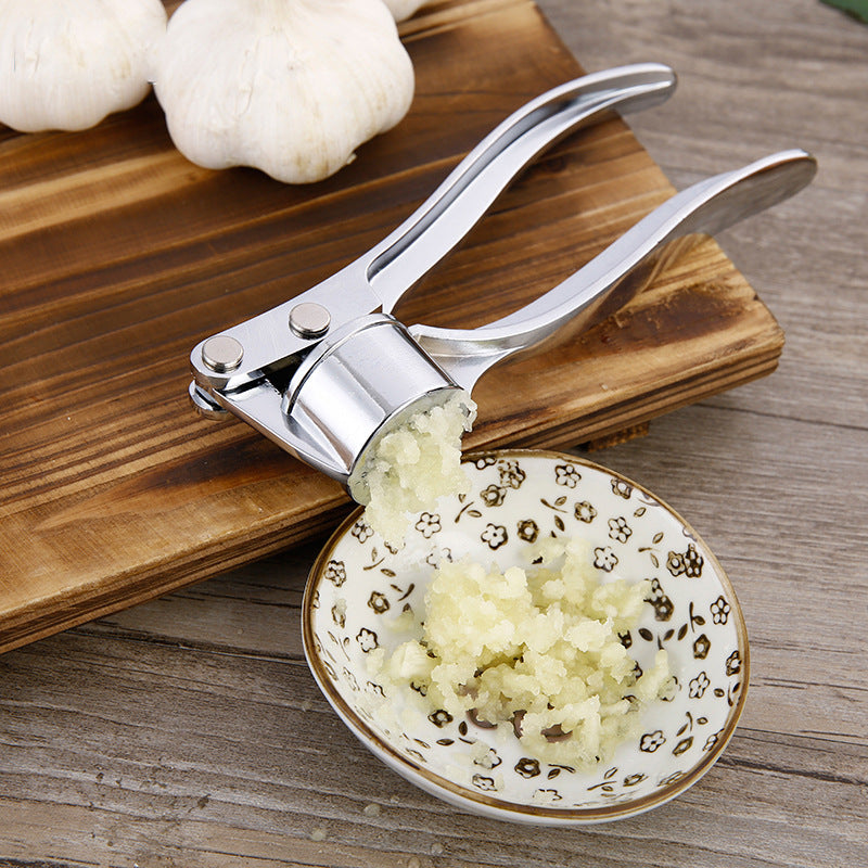 Stainless Steel Garlic Press & Mincer - Handheld Kitchen Tool for Crushing Garlic & Ginger, Multifunction Squeezer & Masher